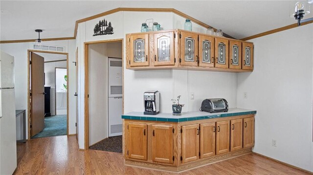 23603 69th Ave, Cadott, WI 54727 - bar with vaulted ceiling, ornamental molding, light wood-type flooring, baseboards, and visible vents