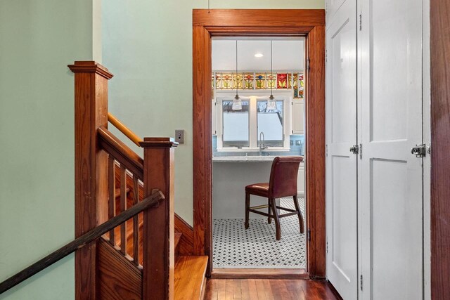 745 S Quincy St, Green Bay, WI 54301 - hallway with dark wood-style floors