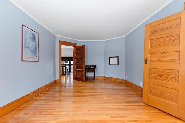 745 S Quincy St, Green Bay, WI 54301 - spare room featuring light wood-type flooring, ornamental molding, and baseboards