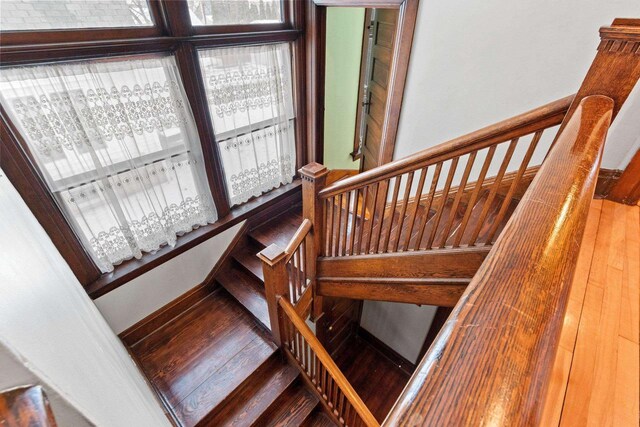 745 S Quincy St, Green Bay, WI 54301 - stairs with a wealth of natural light and hardwood / wood-style flooring