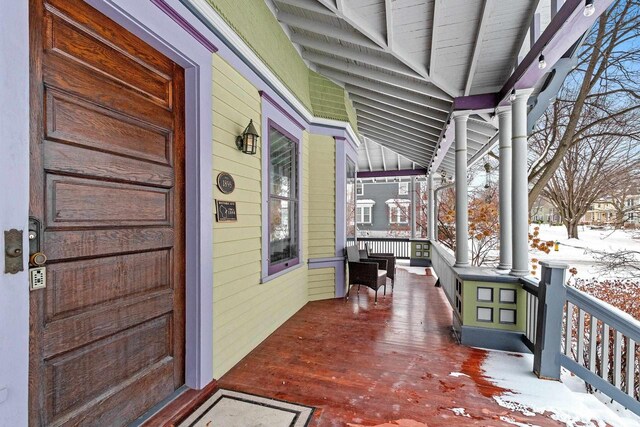 745 S Quincy St, Green Bay, WI 54301 - snow covered deck featuring covered porch