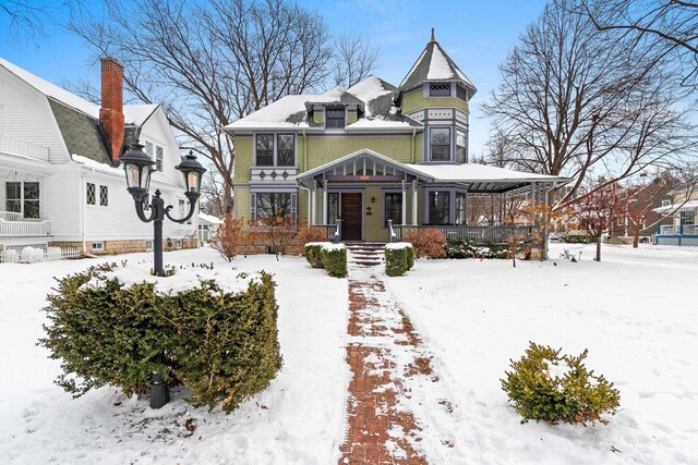 745 S Quincy St, Green Bay, WI 54301 - victorian house featuring covered porch