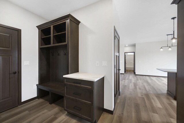 2081 Antelope Trl, Kaukauna, WI 54130 - mudroom featuring baseboards and light wood-type flooring