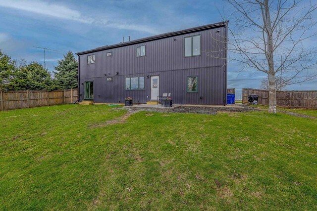 N7315 Winnebago Dr, Fond Du Lac, WI 54935 - rear view of property with entry steps and a patio area
