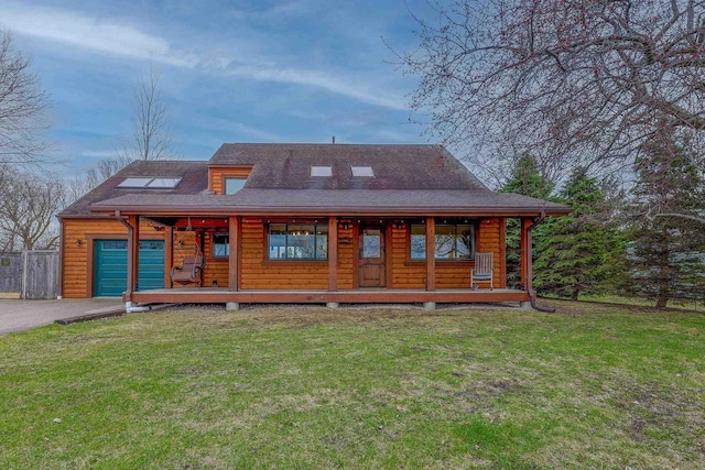 N7315 Winnebago Dr, Fond Du Lac, WI 54935 - log home featuring a porch, a front lawn, and roof with shingles