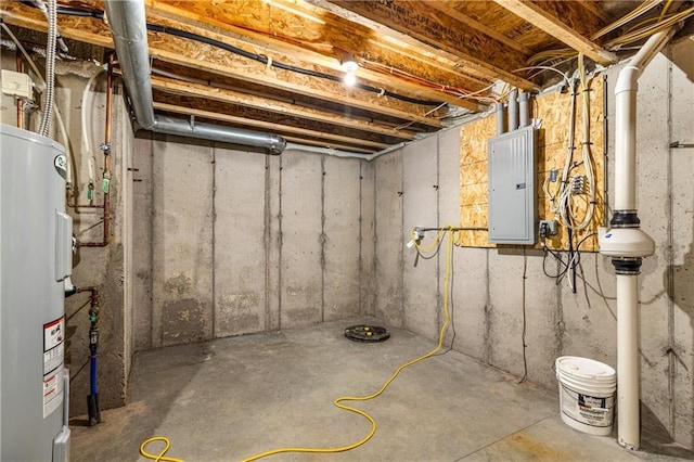 unfinished below grade area featuring water heater and electric panel