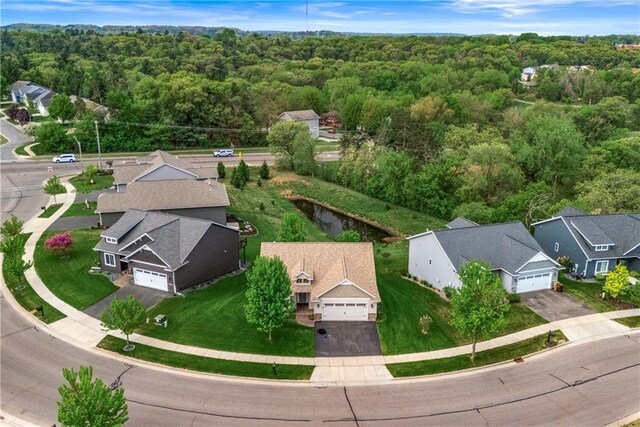 drone / aerial view of a heavily wooded area