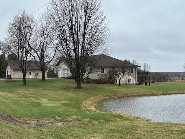 view of yard with a water view