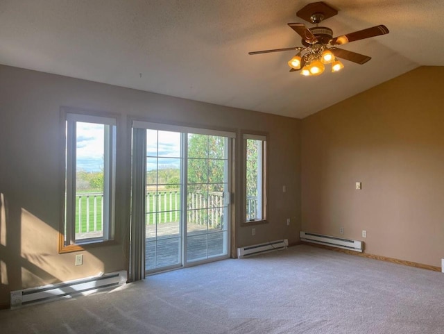 spare room with carpet flooring and baseboard heating