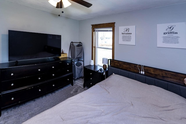 carpeted bedroom featuring a ceiling fan