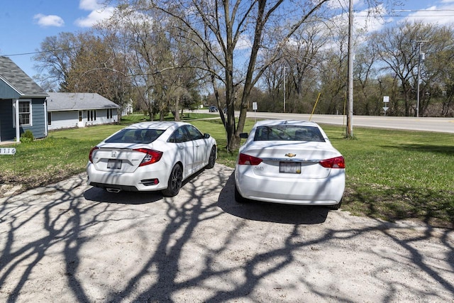 view of parking / parking lot