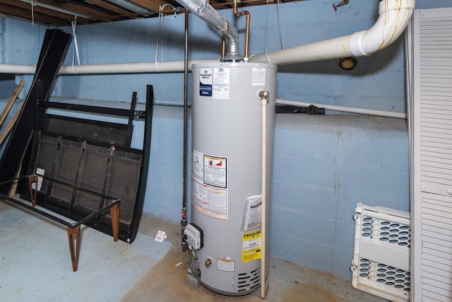 utility room with water heater