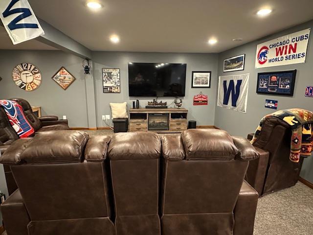 cinema room with recessed lighting, baseboards, and carpet