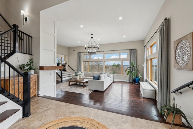 5400 N State Road 83, Hartland, WI 53029 - living area featuring hardwood / wood-style flooring, stairs, and a wealth of natural light