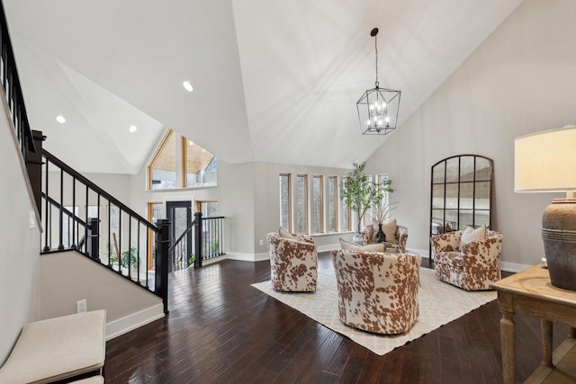 5400 N State Road 83, Hartland, WI 53029 - living room featuring wood-type flooring, high vaulted ceiling, baseboards, and stairs