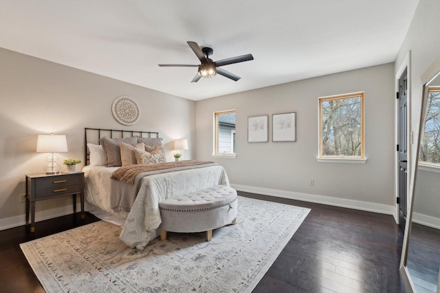 5400 N State Road 83, Hartland, WI 53029 - bedroom with baseboards, dark wood finished floors, and ceiling fan