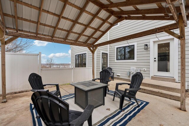 5400 N State Road 83, Hartland, WI 53029 - view of patio featuring fence and a fire pit