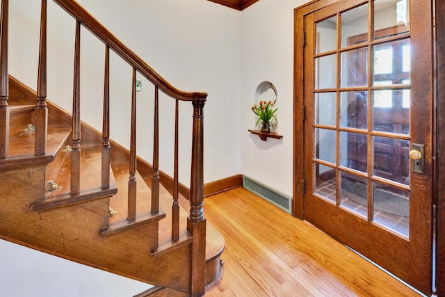 172 N St, Sun Prairie, WI 53590 - staircase featuring wood finished floors and baseboards