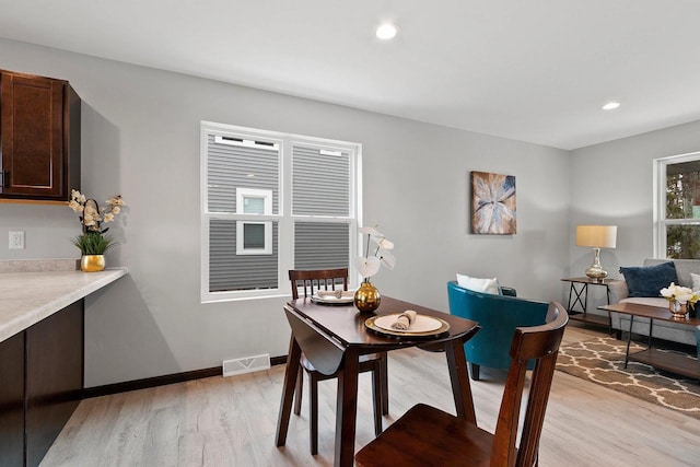 433 Scott St, Ripon, WI 54971 - dining room with baseboards, visible vents, light wood-style floors, and recessed lighting