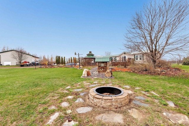 8795 County Rd S, Pulaski, WI 54162 - view of yard featuring an outdoor fire pit and a gazebo