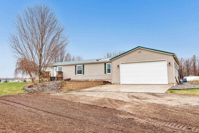 8795 County Rd S, Pulaski, WI 54162 - view of front facade with a garage and driveway
