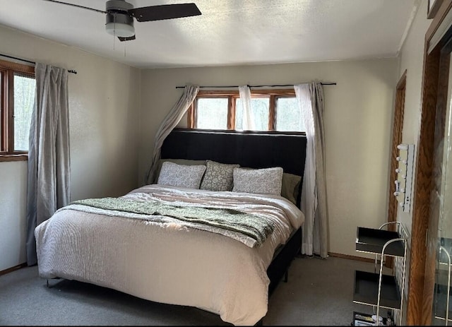 W4609 S Pearl Lake Rd, Redgranite, WI 54970 - carpeted bedroom featuring baseboards and a ceiling fan