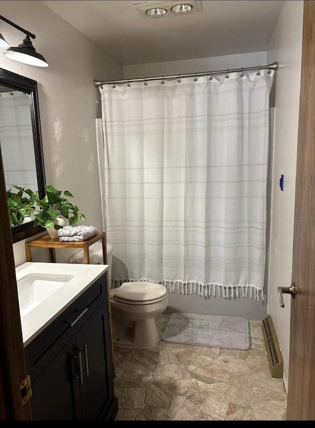 W4609 S Pearl Lake Rd, Redgranite, WI 54970 - bathroom featuring vanity, toilet, and shower / tub combo