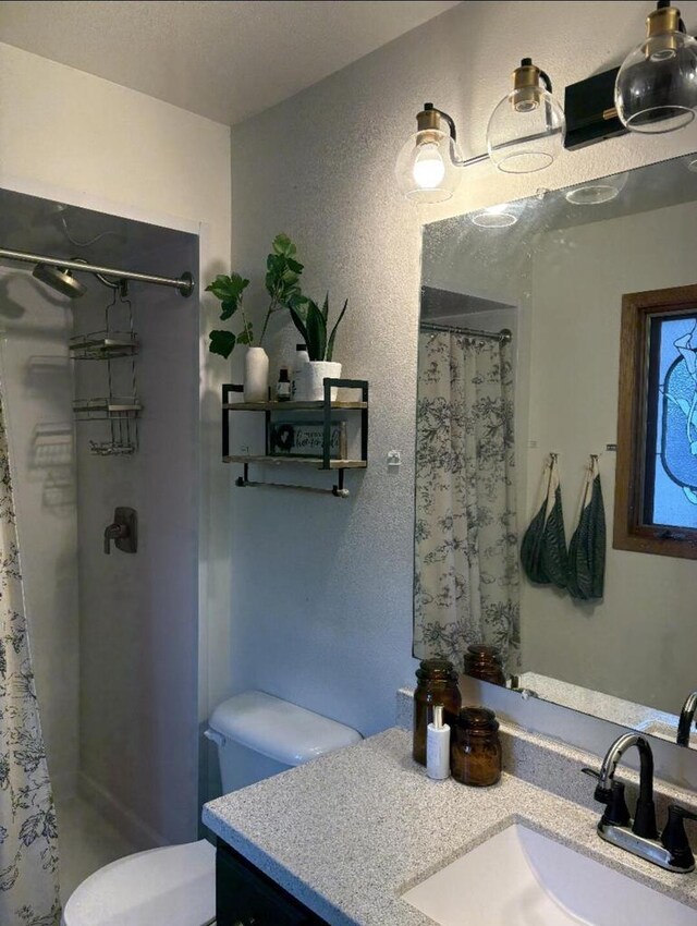 W4609 S Pearl Lake Rd, Redgranite, WI 54970 - full bath with a shower stall, toilet, and vanity