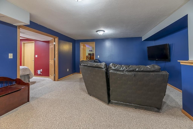 carpeted living room with a textured ceiling and baseboards