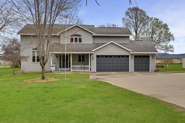traditional-style house featuring covered porch, a shingled roof, a garage, a front yard, and concrete driveway