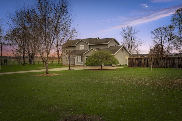 view of front of home with a lawn