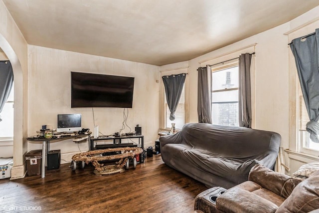 2968 N Buffum St Unit 2968A, Milwaukee, WI 53212 - living area with a healthy amount of sunlight, wood-type flooring, and arched walkways