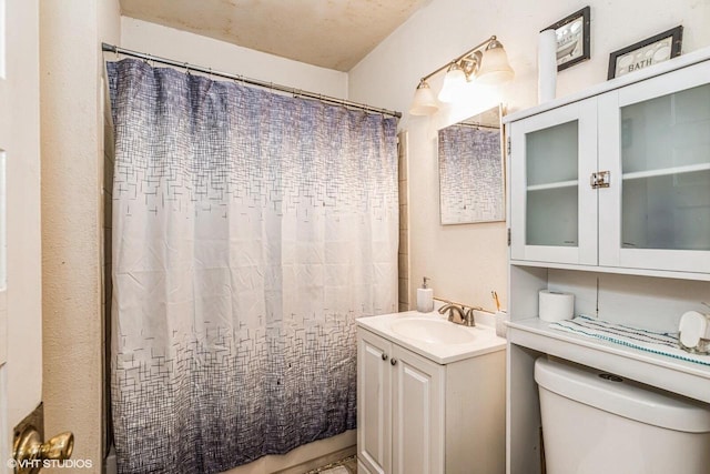 2968 N Buffum St Unit 2968A, Milwaukee, WI 53212 - bathroom featuring toilet, curtained shower, and vanity