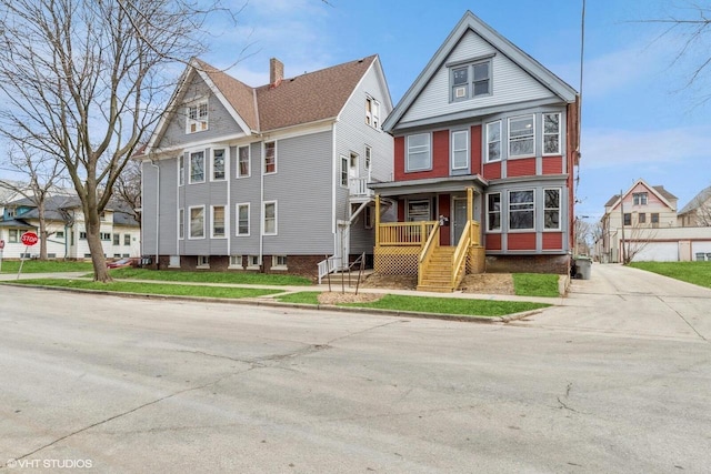 2968 N Buffum St Unit 2968A, Milwaukee, WI 53212 - view of front of house with a porch and concrete driveway