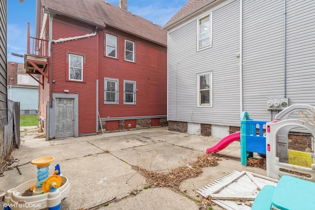 2968 N Buffum St Unit 2968A, Milwaukee, WI 53212 - rear view of property featuring a playground