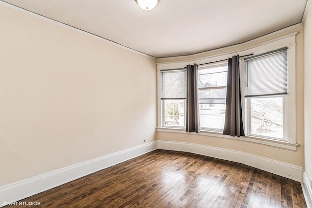 2968 N Buffum St Unit 2968A, Milwaukee, WI 53212 - empty room with baseboards, ornamental molding, and dark wood-type flooring