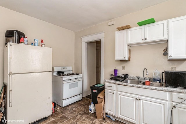 2968 N Buffum St Unit 2968A, Milwaukee, WI 53212 - kitchen with light countertops, a sink, white cabinets, and white appliances
