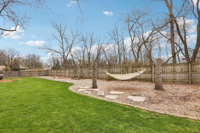 view of yard featuring a fenced backyard