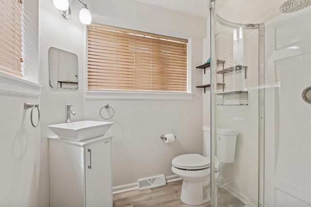 805 Manor Dr, Twin Lakes, WI 53181 - bathroom with visible vents, a shower stall, and vanity