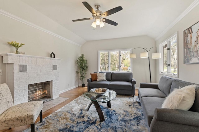 805 Manor Dr, Twin Lakes, WI 53181 - living room with baseboards, ceiling fan, a healthy amount of sunlight, and vaulted ceiling