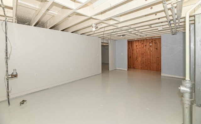 finished basement with wood walls