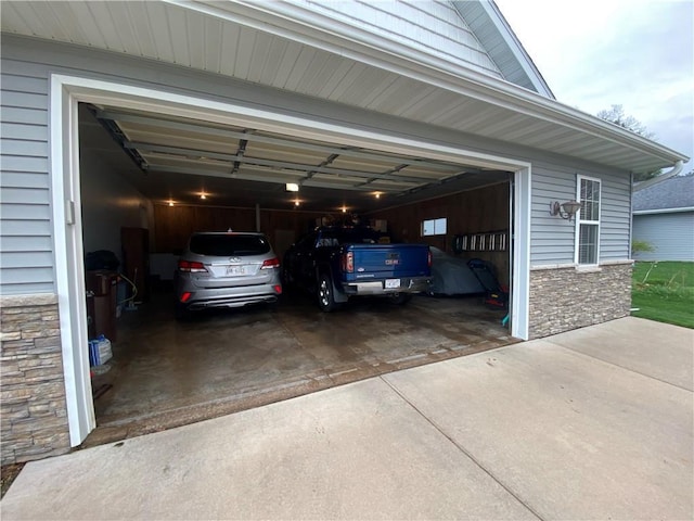 garage featuring driveway