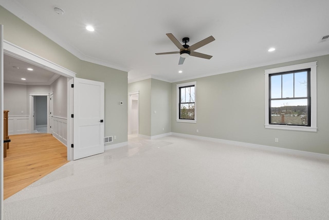 N1931 Linn Rd, Lake Geneva, WI 53147 - spare room featuring recessed lighting, ceiling fan, visible vents, and ornamental molding