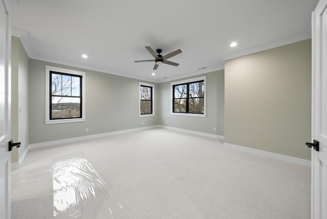 N1931 Linn Rd, Lake Geneva, WI 53147 - spare room featuring crown molding, recessed lighting, and light colored carpet