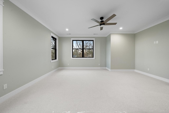 N1931 Linn Rd, Lake Geneva, WI 53147 - spare room featuring ornamental molding, a ceiling fan, recessed lighting, and light colored carpet