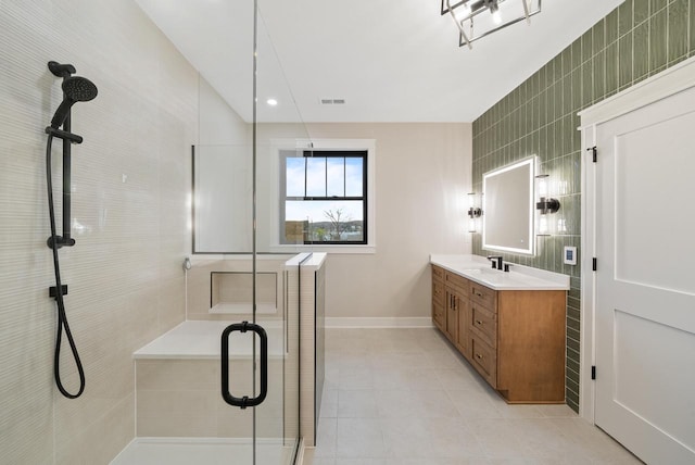 N1931 Linn Rd, Lake Geneva, WI 53147 - full bath with visible vents, a shower stall, vanity, tile patterned floors, and baseboards