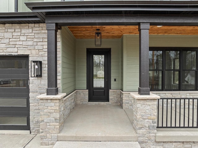 N1931 Linn Rd, Lake Geneva, WI 53147 - property entrance with a porch and stone siding