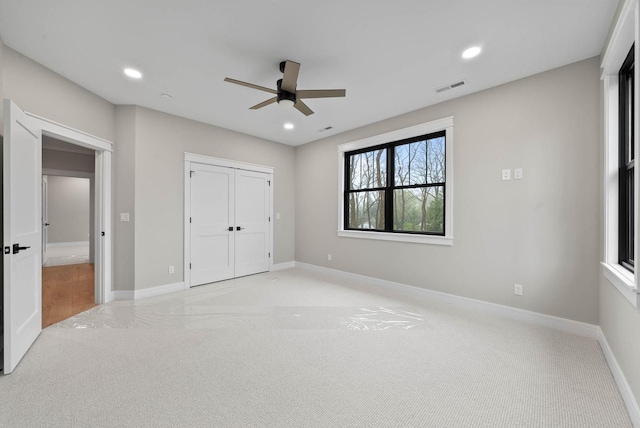 N1931 Linn Rd, Lake Geneva, WI 53147 - unfurnished bedroom featuring light colored carpet, recessed lighting, and visible vents