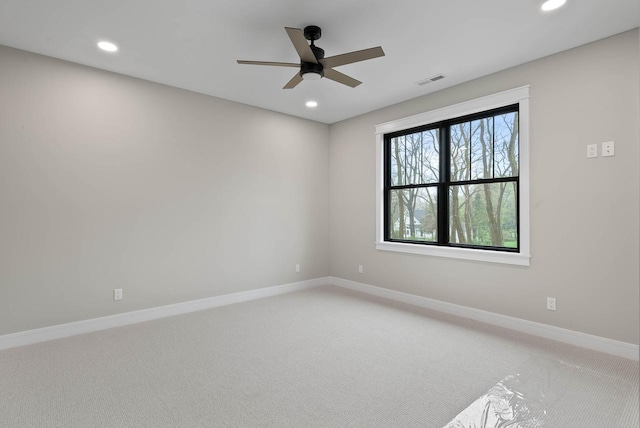 N1931 Linn Rd, Lake Geneva, WI 53147 - empty room with visible vents, recessed lighting, ceiling fan, and light colored carpet