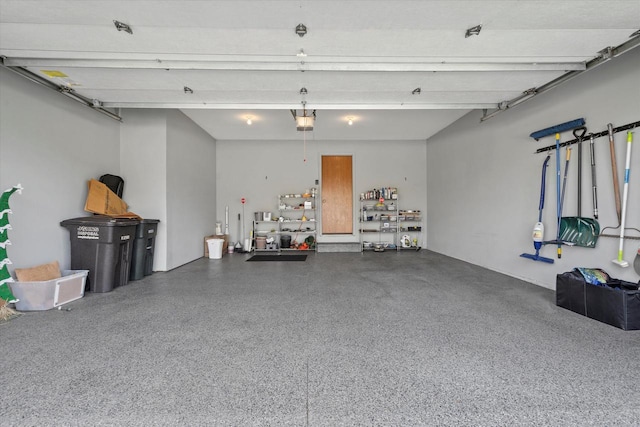 garage featuring a garage door opener